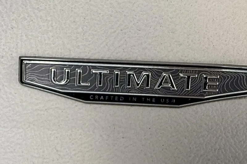 Slide: The Image of 2024 Regal LX9 "Ultimate" badge, crafted in the USA, on textured surface. - 19
