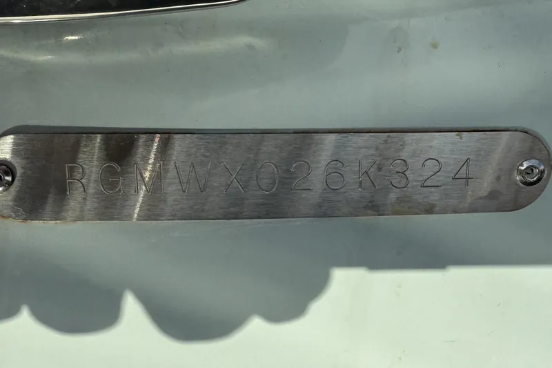 Slide: The Image of 2024 Regal LX9 metal identification plate with serial number RGMWX026K324. - 23