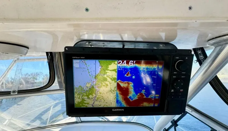 Slide: The Image of Garmin GPS display on 2003 Grady-White Marlin 300 boat dashboard. - 15