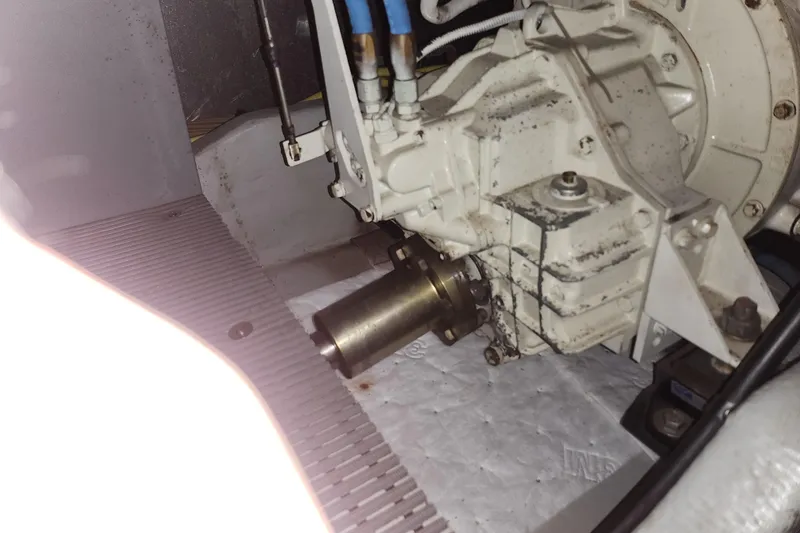 Slide: The Image of Engine component of a 2004 Meridian 411 Sedan, showcasing mechanical details and connections. - 44