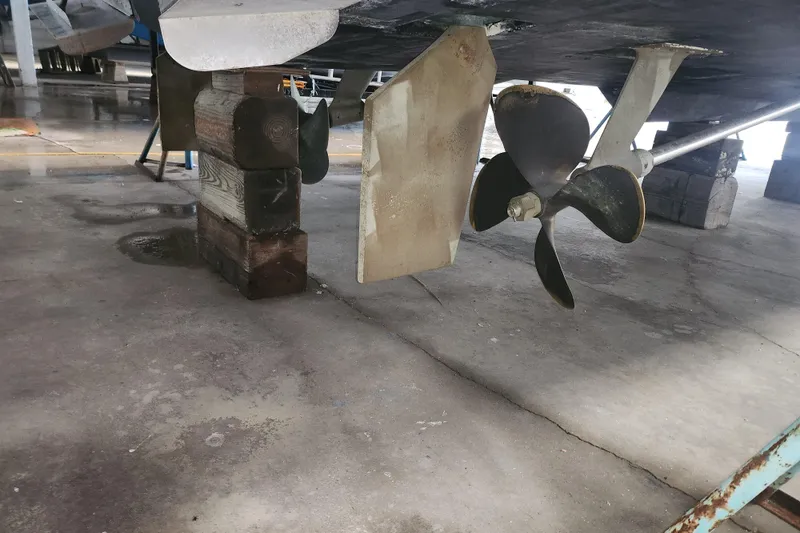 Slide: The Image of Underwater view of 2004 Meridian 411 Sedan propeller and rudder in dry dock. - 48