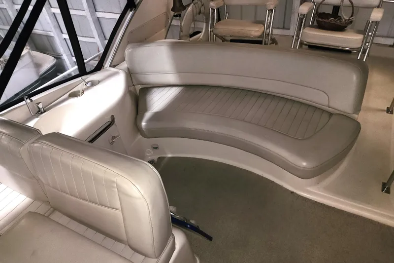 Slide: The Image of Interior of a 2004 Meridian 411 Sedan boat with beige leather seating. - 9
