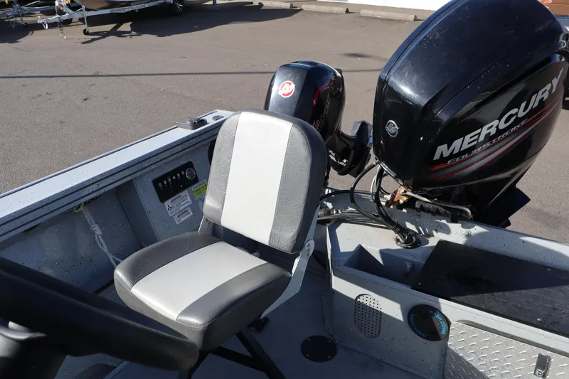 Slide: The Image of 2018 Smoker Craft Pro V Sportsman 2072 CC boat with Mercury engine and seating. - 3