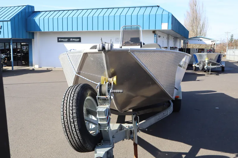 Slide: The Image of 2018 Smoker Craft Pro V Sportsman 2072 CC boat on trailer at dealership. - 6