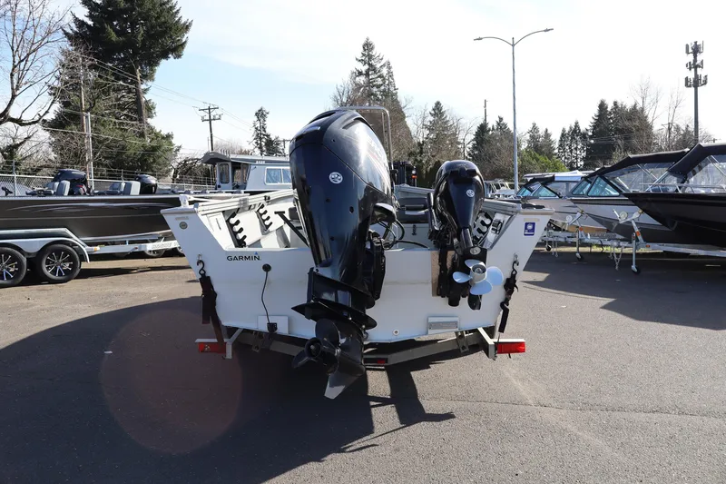 Slide: The Image of 2018 Smoker Craft Pro V Sportsman 2072 CC boat with dual outboard motors. - 7