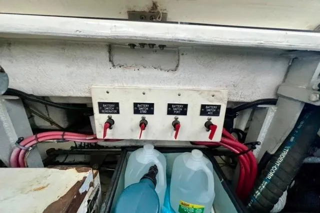Slide: The Image of Battery switches and cables on a 2003 Cruisers Yachts 3772 Express. - 29