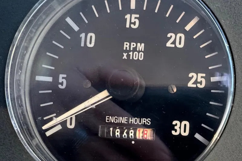 Slide: The Image of Tiara 37 Open 2000 tachometer showing 1868 engine hours and RPM gauge. - 107