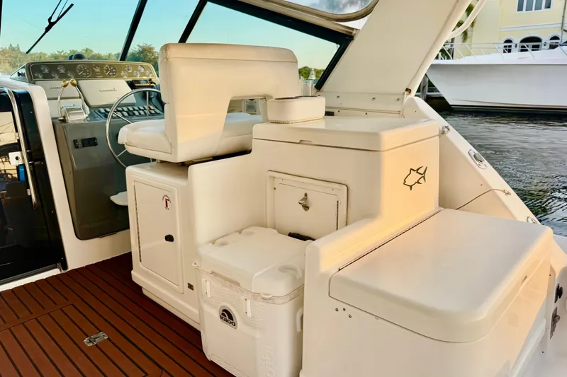 Slide: The Image of Interior of 2000 Tiara 37 Open boat with helm and seating area. - 17