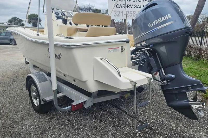 Slide: The Image of 2017 Scout 195 Sportfish boat with Yamaha outboard motor on trailer. - 2