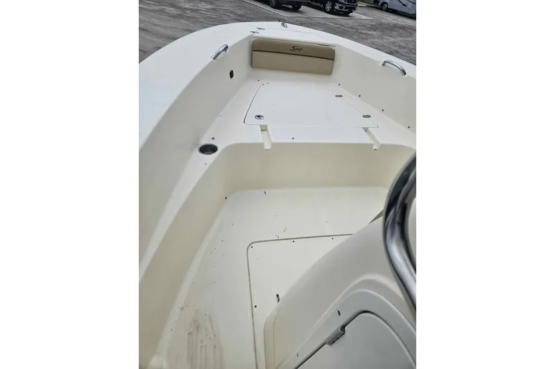 Slide: The Image of 2017 Scout 195 Sportfish boat interior with seating and storage compartments. - 9