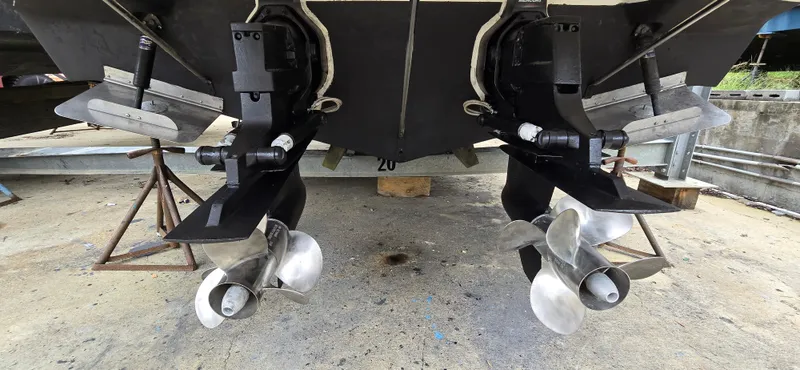 Slide: The Image of 2002 Monterey 322 Cruiser dual propellers on dry dock. - 9