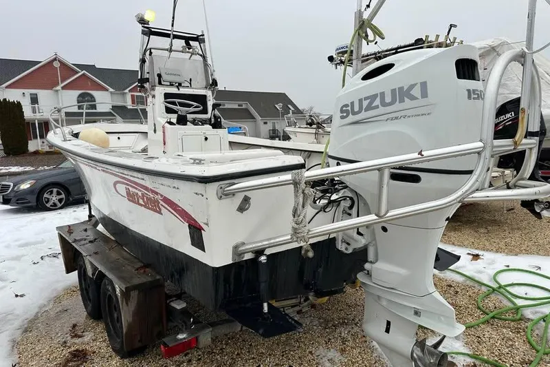 Slide: The Image of 2001 May-Craft 1900CC boat with Suzuki 150 outboard motor on trailer. - 2