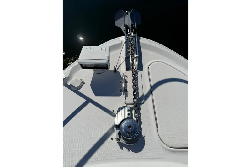 Slide: The Image of Bow of 2000 Sea Ray 410 Express Cruiser with anchor chain and winch. - 34