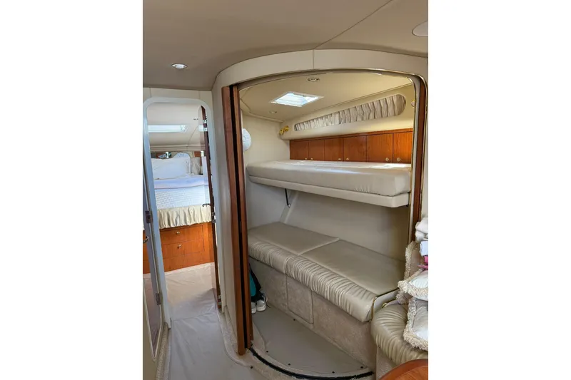 Slide: The Image of Interior of 2000 Sea Ray 410 Express Cruiser with cozy cabin and bunk beds. - 55
