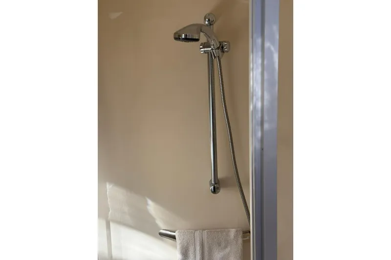 Slide: The Image of Shower area in 2000 Sea Ray 410 Express Cruiser yacht bathroom. - 74
