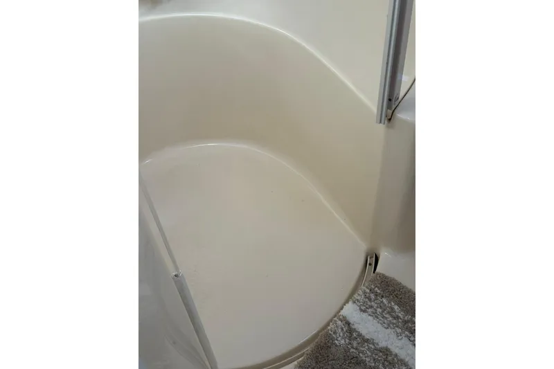 Slide: The Image of Interior of 2000 Sea Ray 410 Express Cruiser shower area. - 75