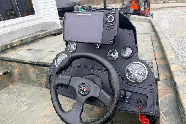 Slide: The Image of 2017 Ranger RT188 boat dashboard with steering wheel and Humminbird fish finder. - 5