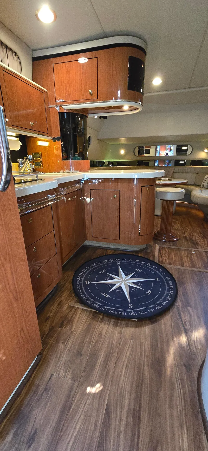 Slide: The Image of Interior of 1999 Sea Ray 50 Sundancer yacht with wood cabinetry and nautical decor. - 17