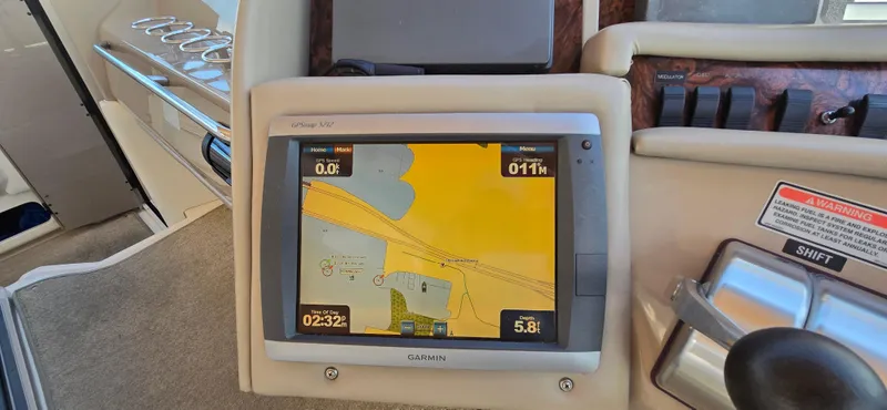 Slide: The Image of Garmin GPS display on 1999 Sea Ray 50 Sundancer yacht dashboard. - 9