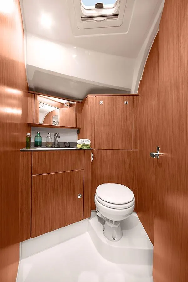 Slide: The Image of 2016 Bavaria Cruiser 41 yacht cockpit with dual steering wheels and navigation system. - 11