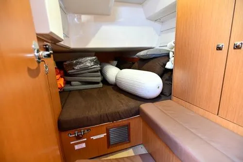 Slide: The Image of Interior cabin of 2016 Bavaria Cruiser 41 yacht with storage and seating. - 16