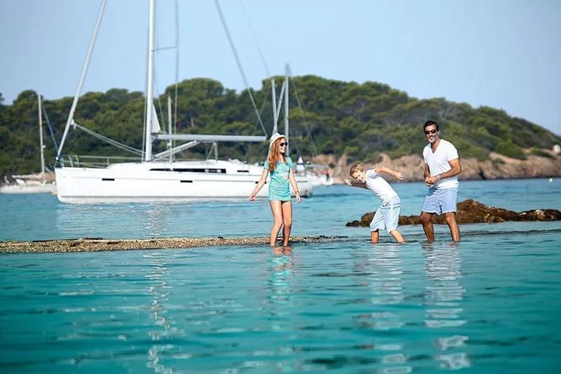 Slide: The Image of Sailing yacht Bavaria Cruiser 41, 2016 model, with sails and rigging against a clear blue sky. - 3