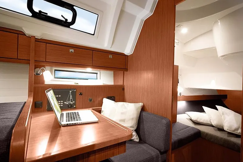 Slide: The Image of 2016 Bavaria Cruiser 41 yacht docked at marina, surrounded by other boats. - 8