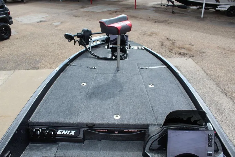 Slide: The Image of 2026 Phoenix 920 Elite X boat deck with seat and control panel. - 12