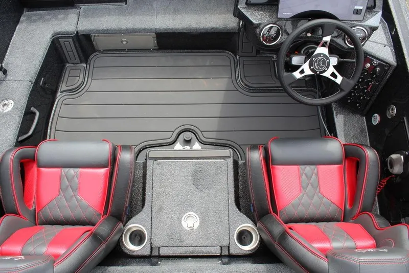 Slide: The Image of Interior of 2026 Phoenix 920 Elite X boat with red and black seats, steering wheel, and dashboard. - 13