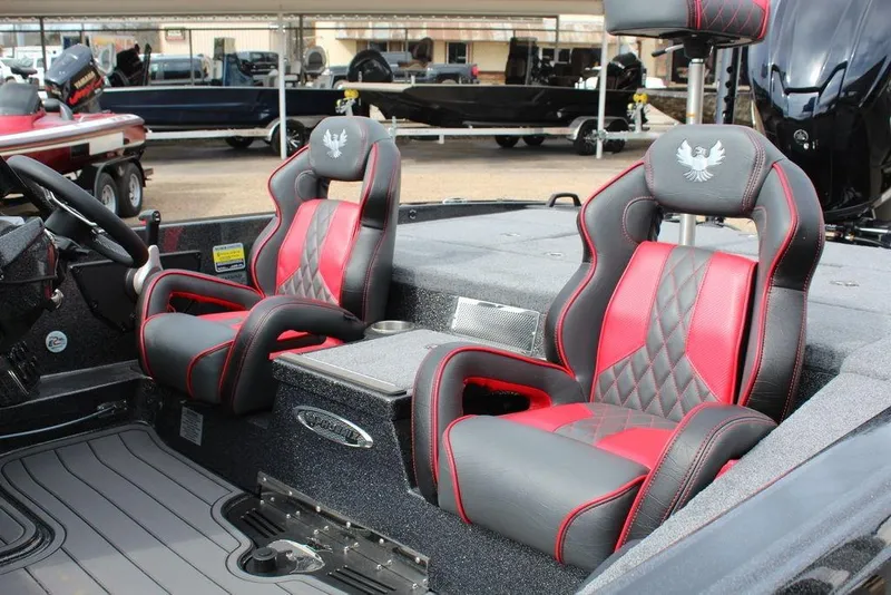 Slide: The Image of Luxury seating in 2026 Phoenix 920 Elite X boat, featuring red and black design. - 14