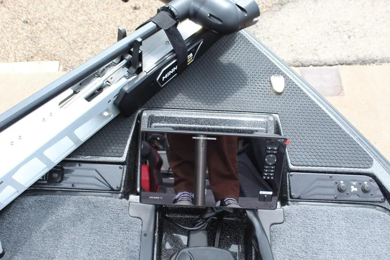 Slide: The Image of Dashboard of a 2026 Phoenix 920 Elite X boat with electronic controls and display. - 15