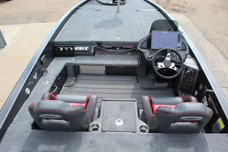 Slide: The Image of 2026 Phoenix 920 Elite X boat interior with dual seats and advanced dashboard controls. - 16