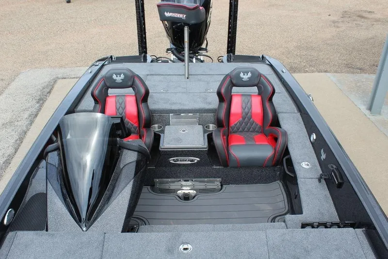 Slide: The Image of Interior of 2026 Phoenix 920 Elite X boat with red and black seating. - 18