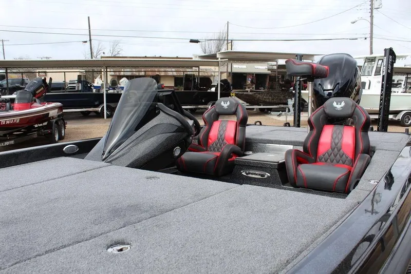 Slide: The Image of 2026 Phoenix 920 Elite X boat interior with red and black seats, showcasing modern design. - 8