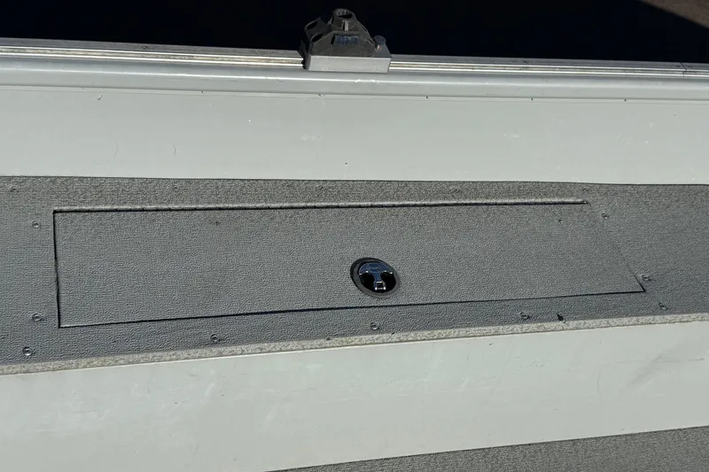 Slide: The Image of 2015 Smoker Craft Freedom 160 TL boat storage compartment with latch. - 19