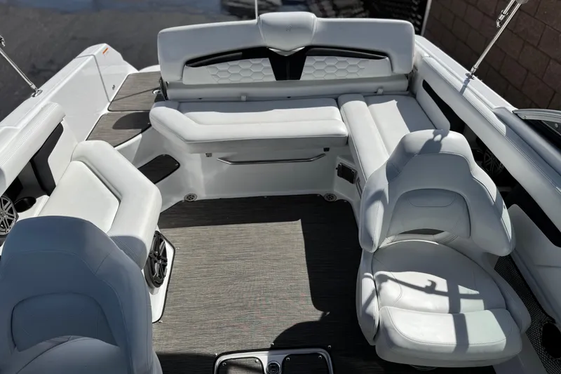 Slide: The Image of Luxurious interior of 2023 Four Winns HD3 boat with white seating and modern design. - 21