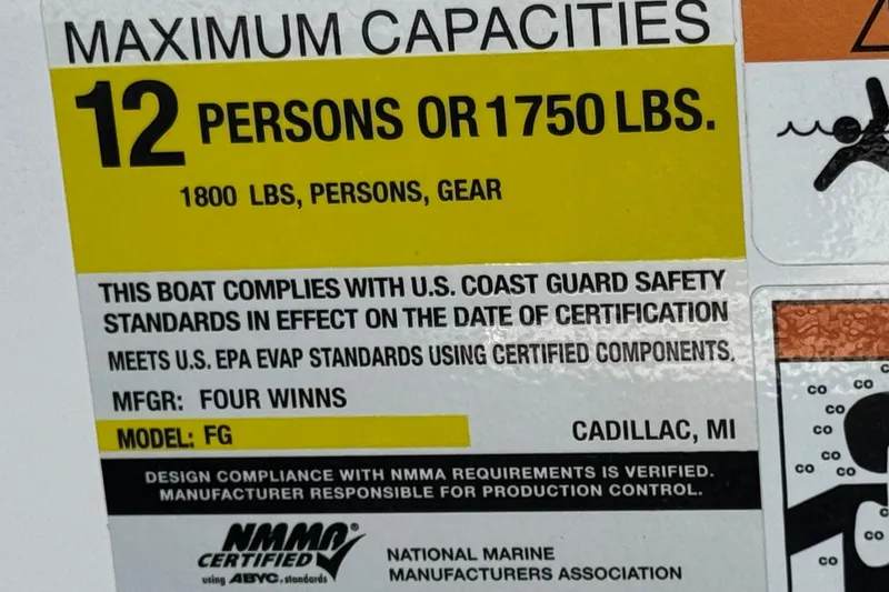 Slide: The Image of 2023 Four Winns HD3 boat capacity label: 12 persons or 1750 lbs, U.S. Coast Guard compliant. - 40