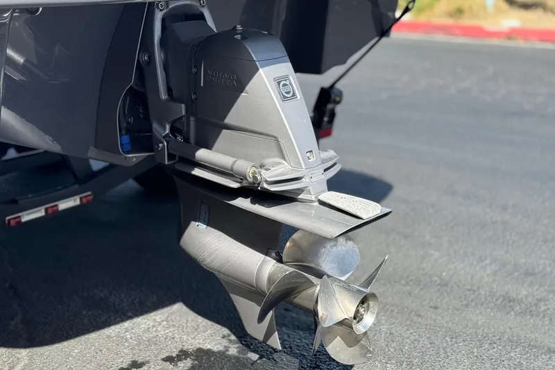 Slide: The Image of Close-up of a 2023 Four Winns HD3 boat's Volvo Penta outdrive and propeller. - 8
