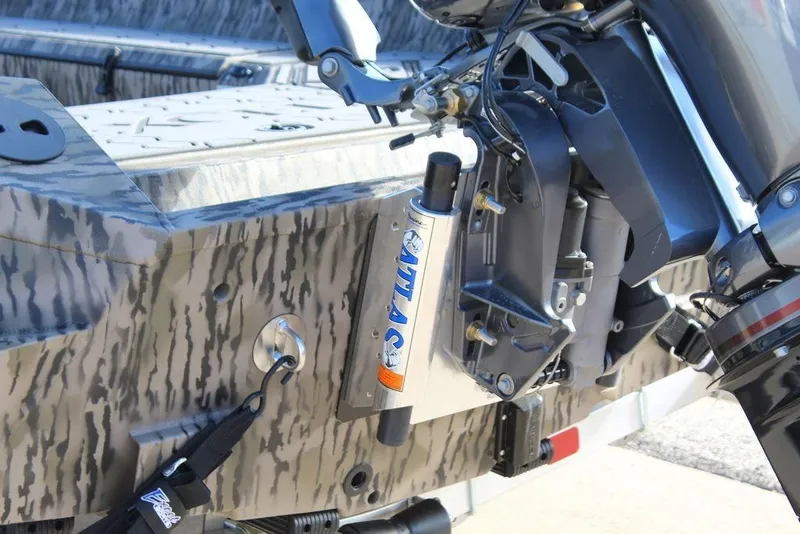 Slide: The Image of 2026 Excel 183 Tomahawk boat engine mount with hydraulic system and camouflage design. - 10