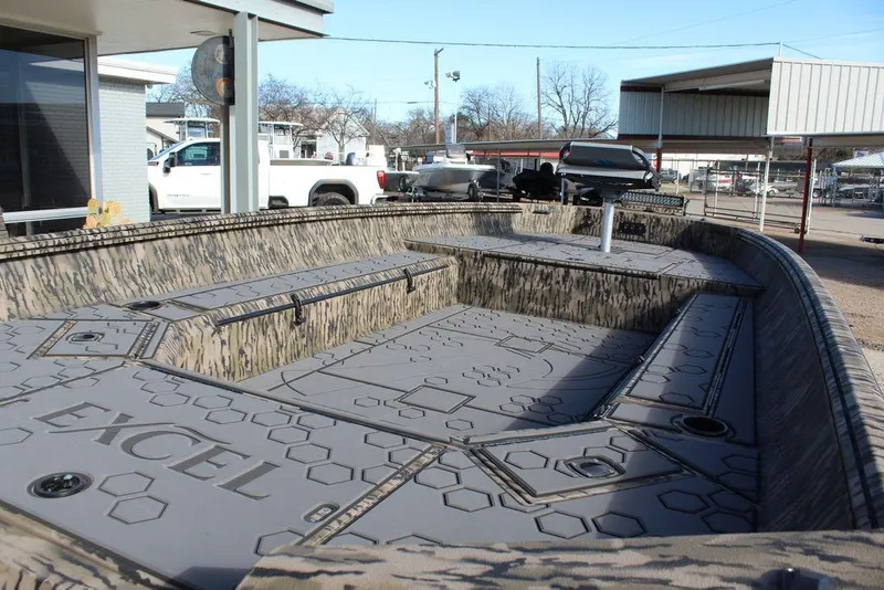 Slide: The Image of 2026 Excel 183 Tomahawk boat with camouflage design and spacious interior. - 14