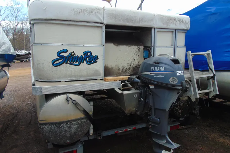 Slide: The Image of Pontoon boat with Yamaha 20 outboard motor, Forrest River Sting Rae model 1903, year 2004. - 3