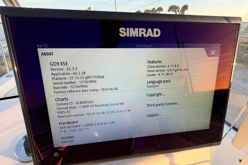 Slide: The Image of Simrad GO9 XSE display on a 2010 Boston Whaler 170 Montauk boat, showing software details. - 37