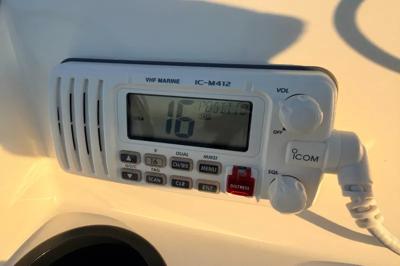 Slide: The Image of VHF marine radio on 2010 Boston Whaler 170 Montauk boat dashboard. - 38