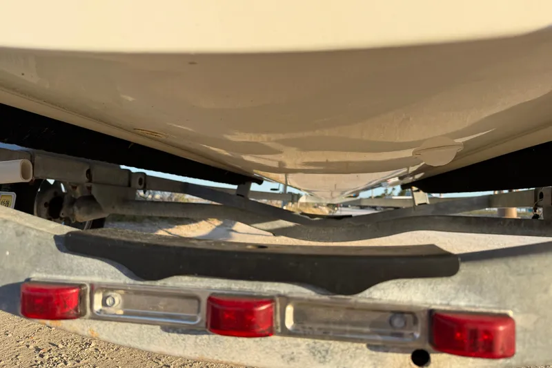 Slide: The Image of Underside view of a 2010 Boston Whaler 170 Montauk on a trailer. - 8