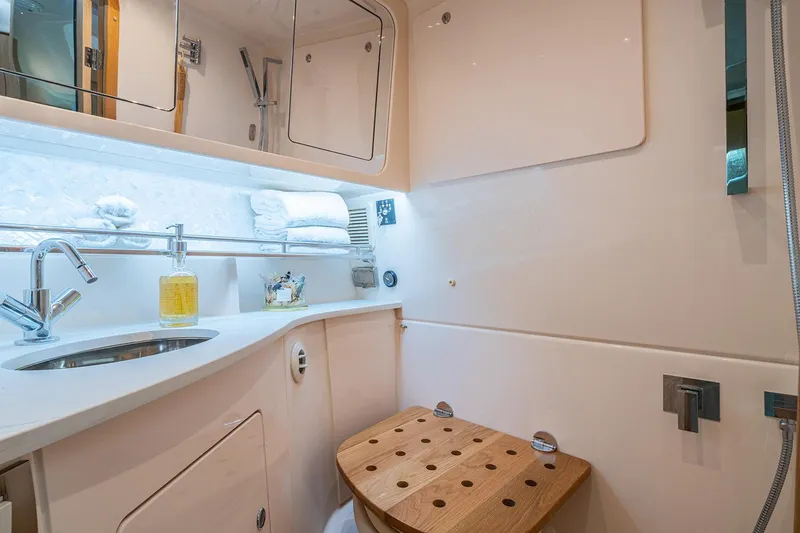 Slide: The Image of Manufacturer Provided Image: Luxurious bathroom in 2026 Grady-White Express 340 yacht, featuring modern fixtures and elegant design. - 19