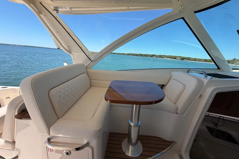 Slide: The Image of Luxurious seating area on 2026 Grady-White Express 340 boat with ocean view. - 23