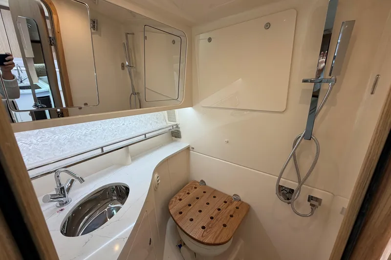Slide: The Image of Luxurious bathroom in 2026 Grady-White Express 340 boat with modern fixtures. - 35