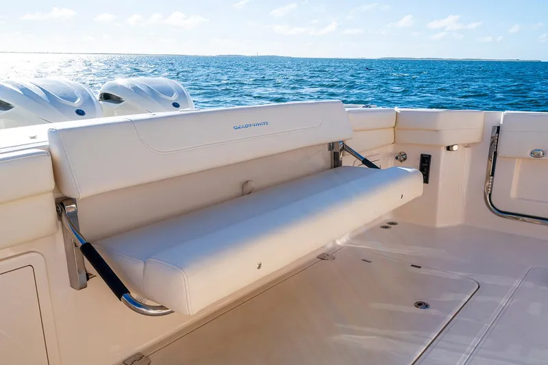 Slide: The Image of Manufacturer Provided Image: 2026 Grady-White Express 340 boat interior with seating, overlooking the ocean. - 4