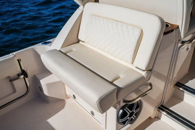 Slide: The Image of Luxury seating on 2026 Grady-White Express 340 boat, featuring elegant design and comfort. - 7