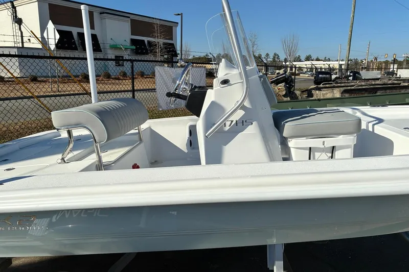 Slide: The Image of 2026 ALK2 Powerboats 17HS model, sleek white design, outdoor display. - 3